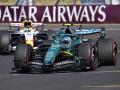 Aston Martin's Spanish driver Fernando Alonso competes ahead of Racing Bulls' British driver Arvid Lindblad during the Formula One Hungarian Grand Prix at the Hungaroring racetrack in Mogyorod near Budapest, Hungary, on July 26, 2026. (Photo by Ferenc ISZA / AFP)