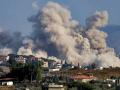 Smoke rises following an Israeli controlled-explosion on the village of Kfartibnit as seen from Nabatieh in southern Lebanon on July 29, 2026. While violence has declined since the signing of a preliminary US-Iran deal in June and the Lebanon-Israel agreement, Lebanon continues to report intermittent Israeli strikes and artillery shelling on the south. Lebanon's army on July 26 condemned ongoing Israeli military activities that it said were preventing its full deployment under the framework deal. (Photo by Ammar Ammar / AFP) /