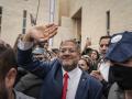 Itamar Ben-Gvir, 49, Israel's Minister of National Security, waves supporters after a rally in his support, in front of the Israeli Supreme Court in Jerusalem.