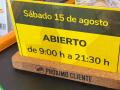 Imagen del cartel con el horario de Consum para este 15 de agosto.
