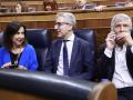 Margarita Robles y Fernando Grande-Marlaska, a ambos lados de Arcadi España