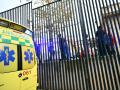Una ambulancia en las inmediaciones de un centro de inmigrantes de Ceuta