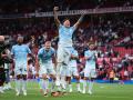Los jugadores del City celebran la victoria ante el United