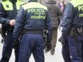 Muncipal Policemen  on duty in Madrid, armed with truncheons and pistols.