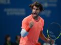 Carlos Alcaraz, durante la primera ronda en el ATP 500 de Tokio