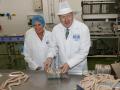 Conservative MP and leadership contender Boris Johnson makes sausages during a visit to Heck Foods near Bedale, northwest England on July 4, 2019. - Britain's leadership contest is taking the two contenders on a month-long nationwide tour where they will each attempt to reach out to grassroots Conservatives in their bid to become prime minister. (Photo by Darren Staples / POOL / AFP)