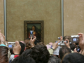 La Mona Lisa fotografiada por cientos de personas en el Louvre