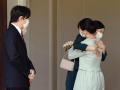 Princess Mako of Akishino hugs her sister Princess Kako before leaving her home in Akasaka Estate in Tokyo on Oct. 26, 2021.