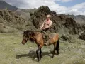 El presidente ruso, Vladimir Putin, descamisado y a lomos de un caballo