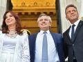 Handout picture released by Argentina's Presidency showing Argentina's President Alberto Fernandez (C), Vice-President Cristina Fernandez de Kirchner (L) and legislator Serio Massa leaving the Congress after the inauguration of the 140th period of ordinary sessions, in Buenos Aires, on March 1, 2022. - Argentina's government on July 28, 2022, appointed the head of the country's lower house of Congress, Sergio Massa, as the new economy "super minister," as Buenos Aires attempts to surmount an economic crisis marked by soaring inflation. Massa's appointment brings together three ministries under his supervision: economy, development and agriculture. (Photo by MARIA EUGENIA CERUTTI / Argentinian Presidency / AFP) / RESTRICTED TO EDITORIAL USE - MANDATORY CREDIT "AFP PHOTO / ARGENTINE PRESIDENCY / MARIA EUGENIA CERUTI" - NO MARKETING - NO ADVERTISING CAMPAIGNS - DISTRIBUTED AS A SERVICE TO CLIENTS