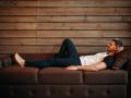 Young happy man lying on couch, side view. Relaxation on sofa. Male person relax.on,sofa,Young,happy,man,lying,couch,sofa, couch, man, lying, casual, male, home, caucasian, lifestyle, indoor, people, white, resting, young, leisure, handsome, relaxation, relax, room, happy, person, portrait, attractive, living, smile, rest, one, view, house, interior, one person, happiness, guy, side, background, cheerful, comfortable, looking, length, break, relaxing, single, domestic, life, technology, enjoyment