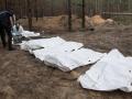Cuerpos encontrados en una fosa común en Izium tras la ocupación rusa
