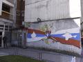 Mural en Mitrovica que representa la alianza entre Rusia y Serbia