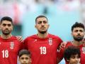 Los jugadores de Irán, durante el himno de su país