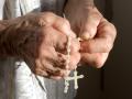 hands of the old woman at prayer.woman,hand,religion,religious,belief,pray,catholic,organ,prayer,christianity,hope,believer,pious,rosary,devotion,service,age,elder,old,rosenkranzgebet,christin