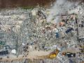 Rescue teams search for victims in the rubble following an earthquake in northwestern Syrian Idlib in the rebel-held part of Idlib province, on February 6, 2023. -