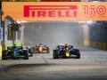 18 STROLL Lance (can), Aston Martin F1 Team AMR22, and 01 VERSTAPPEN Max (nld), Red Bull Racing RB18, action during the Singapore Formula One Grand Prix, at the Marina Bay City Circuit in Singapore, Sunday, Oct.2, 2022.