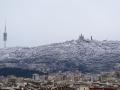 Aspecto de la montaña del Tibidabo de Barcelona tras la nevada caída la pasada madrugada