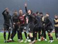 Los jugadores del Milan celebran pase a cuartos de final de la Champions
