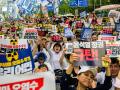 Thousands of people take part in a rally in Seoul on August 26, 2023, to protest against Japan's discharge of treated wastewater from the crippled Fukushima nuclear power plant. (Photo by ANTHONY WALLACE / AFP)