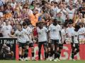 Los jugadores del Valencia celebran el primer gol ante el Atlético de Madrid