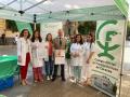 El presidente del Colegio de Farmacéuticos y miembros del Colegio en la carpa instalada en Gran Capitán