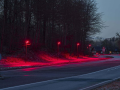 Farolas con luces rojas en Suecia y Dinamarca