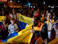 Ciudadanos venezolanos participan en una manifestación