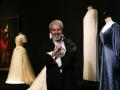 -FOTODELDIA- MADRID, 15/10/2024.- El modisto Lorenzo Caprile posa ante algunas de las piezas de la exposición 'Lorenzo Caprile', un viaje por los vestidos más icónicos del modista durante la inauguración de la muestra este martes en la Sala Canal de Isabel II en Madrid. EFE/ Borja Sanchez-Trillo