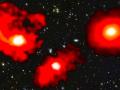 Los tres monstruos rojos son galaxias extremadamente masivas y polvorientas de los primeros mil millones de años después del Big Bang