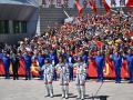 Astronauts of the Chinese space mission Shenzhou-20, Wang Jie, Chen Zhongrui and Chen Dong, greet during a farewell ceremony