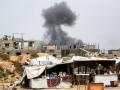 Una columna de humo se eleva en Beit Lahia al norte de la franja de Gaza