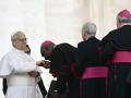Pope Leo XIV greets bishops at the end of his first weekly general audience at St Peter's Square in The Vatican on May 21, 2025. (Photo by Filippo MONTEFORTE / AFP)