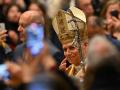 Pope Leo XIV arrives to lead the hristmas Eve mass at St Peter's Basilica in the Vatican on December 24, 2025. (Photo by Andreas SOLARO / AFP)