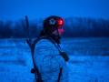 In this handout photograph taken on January 21, 2026 and released on January 22, 2026 by the press service of the 93rd Kholodnyi Yar Separate Mechanized Brigade of the Ukrainian Ground Forces, a Ukrainian soldier stands in a field at an undisclosed location near Druzhkivka, Donetsk region, amid the Russian invasion of Ukraine. (Photo by Iryna Rybakova / The 93rd Kholodnyi Yar Separate Mechanized Brigade / AFP) / RESTRICTED TO EDITORIAL USE - MANDATORY CREDIT "AFP PHOTO / PRESS SERVICE OF THE 93RD KHOLODNYI YAR SEPARATE MECHANIZED BRIGADE / IRYNA RYBAKOVA" - NO MARKETING NO ADVERTISING CAMPAIGNS - DISTRIBUTED AS A SERVICE TO CLIENTS