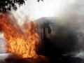 A bus burns at one of the main avenues after it was set on fire by organised crime groups in response to an operation in Jalisco to arrest a high-priority security target in Zapopan, state of Jalisco, Mexico, on February 22, 2026. Armed civilians blocked several roads in the state of Jalisco, in western Mexico, following an operation by federal forces in the town of Tapalpa, local authorities reported. Jalisco, which will host four matches of the upcoming 2026 World Cup, is home to the powerful Jalisco New Generation Cartel (CJNG), and has been rocked by several episodes of violence in recent years. (Photo by Ulises RUIZ / AFP)