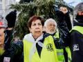 Imagen de archivo de una mujer en las protestas por las pensiones.