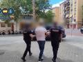 Imagen del traslado del detenido por parte de la Policía Nacional