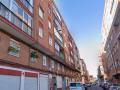 Una calle del barrio de Pajarillos, en Valladolid