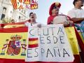 Asistentes a la manifestación con motivo del Día de Ceuta en Cibeles, Madrid