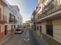 Calle Torrechiva, en el barrio sevillano de Torreblanca, donde ha ocurrido el crimen
