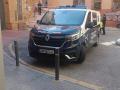 Imagen de un coche de la Policía Nacional en la zona de Málaga donde se ha producido un tiroteo