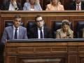 El ministro de Economía, Carlos Cuerpo, entre Pedro Sánchez y Yolanda Díaz.