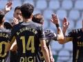 Los jugadores del Córdoba celebran un gol en un amistoso de entrenamiento