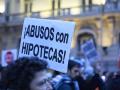 Imagen de una pancarta durante una manifestación por la vivienda