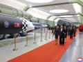 This picture taken on October 11, 2026 and released by North Korea's official Korean Central News Agency (KCNA) on October 13, 2026 shows North Korean leader Kim Jong Un, his wife Ri Sol Ju and his daughter Kim Ju Ae touring the Second Economic Committee National Defense Revolution Museum in Pyongyang. (Photo by Handout / KCNA / AFP) / South Korea OUT / SOUTH KOREA OUT / SOUTH KOREA OUT / ---EDITORS NOTE--- RESTRICTED TO EDITORIAL USE - MANDATORY CREDIT "AFP PHOTO/KCNA VIA KNS" - NO MARKETING NO ADVERTISING CAMPAIGNS - DISTRIBUTED AS A SERVICE TO CLIENTS
THIS PICTURE WAS MADE AVAILABLE BY A THIRD PARTY. AFP CAN NOT INDEPENDENTLY VERIFY THE AUTHENTICITY, LOCATION, DATE AND CONTENT OF THIS IMAGE. /