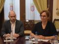 La ministra de Sanidad, Mónica García, acompañada del exdelegado del Gobierno en Ceuta, Miguel Ángel Pérez