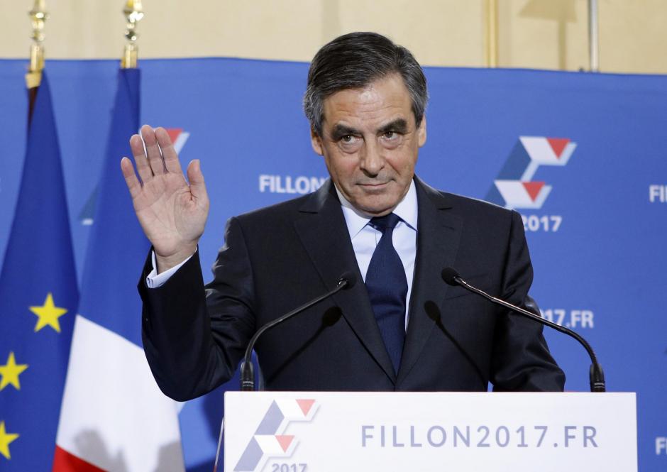 Francois Fillon acknowledges after the official announcement of results in the conservative party's national primary election in Paris, France, Sunday, Nov. 27, 2016 in Paris.