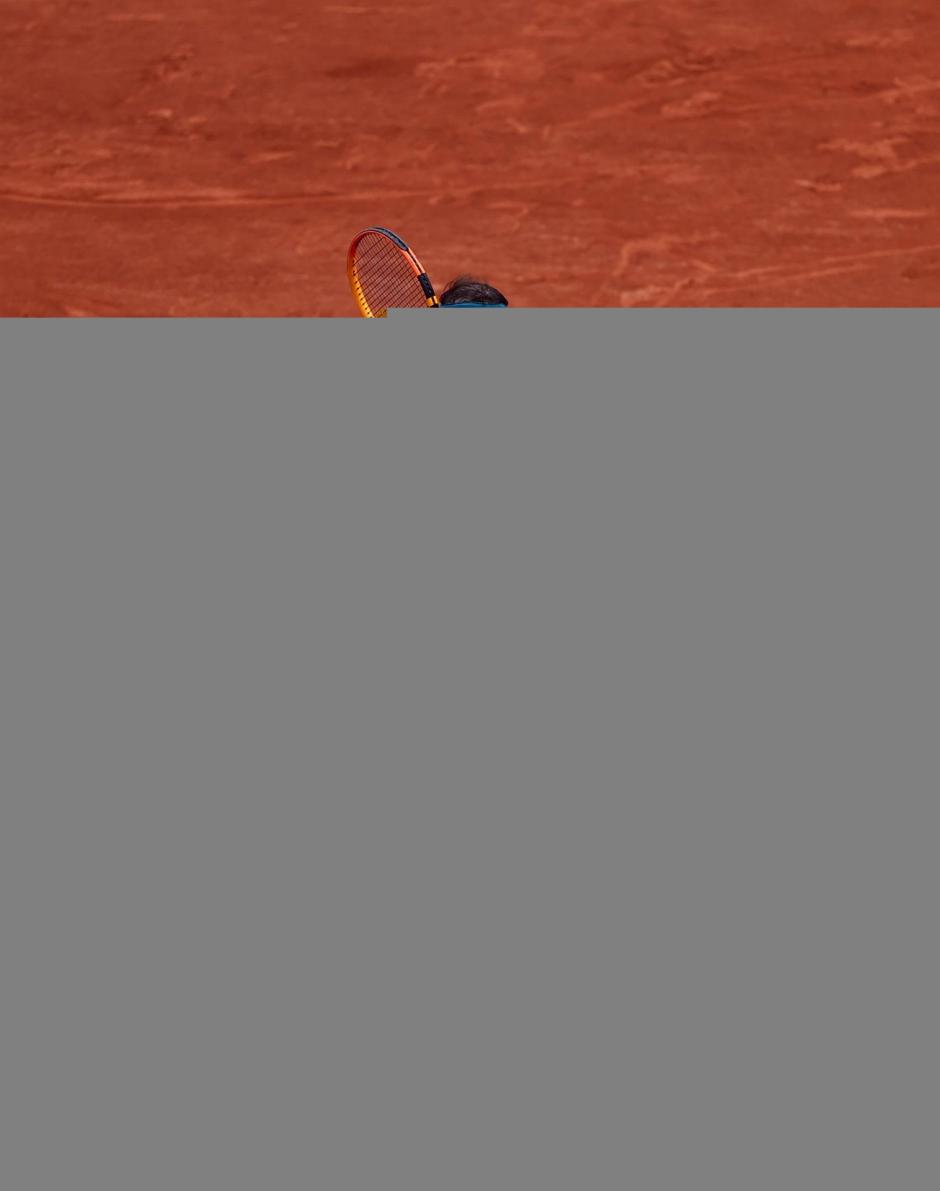 Nadal junta las manos tras ganara su 14º Roland Garros