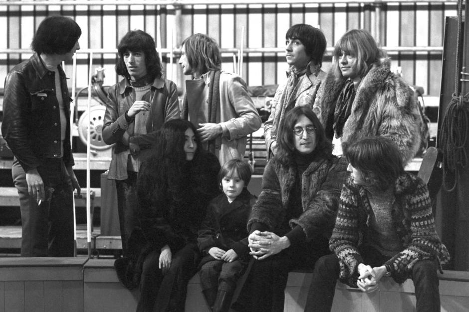 File photo dated 10/12/68 of (Front row left to right) Japanese actress Yoko Ono, Julian Lennon and his father John Lennon (of the Beatles) at the rehearsal of the Rolling Stones Rock and Roll Circus, at the Intertel Studios, Wembley, London. John will be one of the guest stars, which will also feature Sir Robert Fossetts Circus. Also shown (back row) are Pete Townshend (left) and Keith Moon (2nd right) from The Who, Bill Wyman (2nd left), Charlie Watts (centre) and Brian Jones (right) of the Rolling Stones.